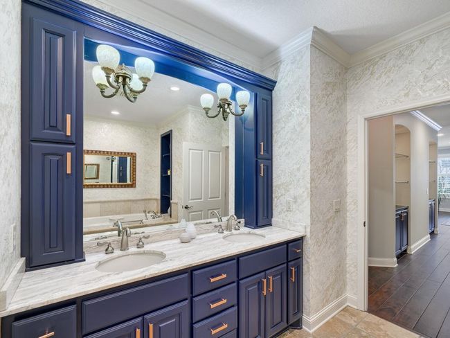 Double vanity in the private full bath. | Image 21