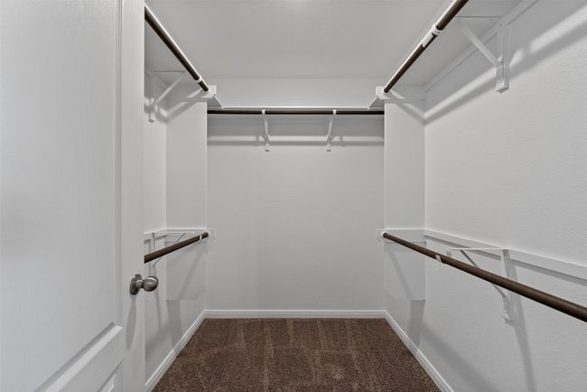 Spacious closet featuring carpet flooring | Image 25