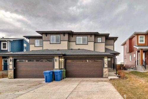 1053 Waterford Drive, Home with 3 bedrooms, 3 bathrooms and 4 parking in Chestermere AB | Card Image