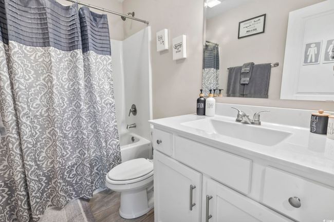 Full bath with vanity and shower / bath combo with shower curtain | Image 24