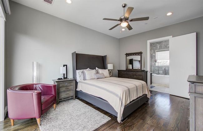 Primary suite, located on the 3rd floor, boasts high ceilings, floor to ceiling windows with custom, black-out automatic window shades | Image 24