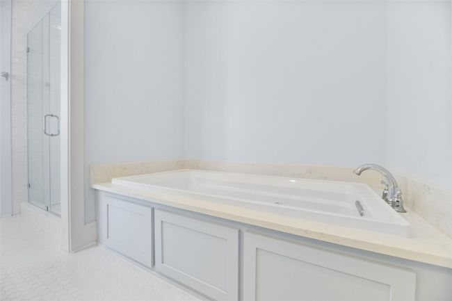 Large whirlpool tub is the perfect place to unwind. | Image 28