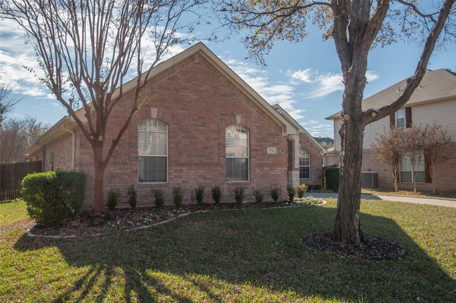 View of side of property with brick siding and cooling unit | Image 21