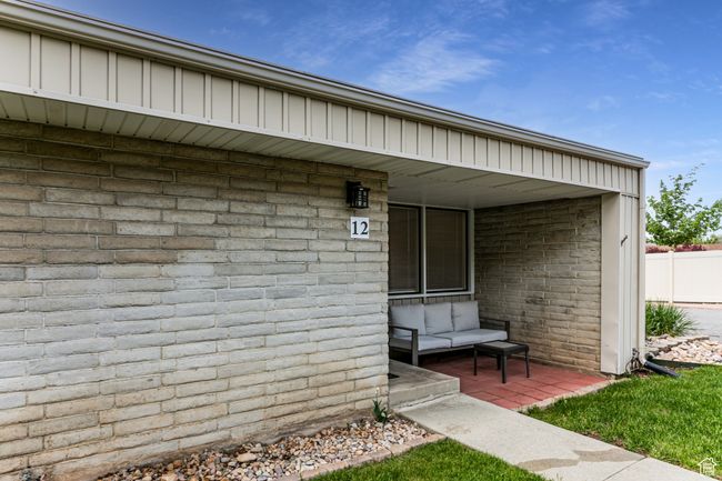 Entrance to property with brick siding and fence | Image 5