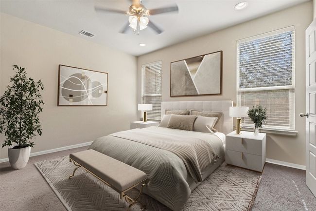 Virtually Staged: Retreat to the ground-floor primary suite for ultimate privacy. | Image 9