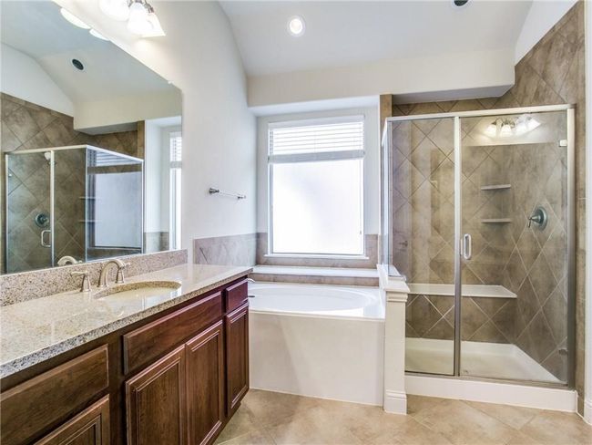 Full bathroom with vanity, a bath, a shower stall, tile patterned flooring, and recessed lighting | Image 13