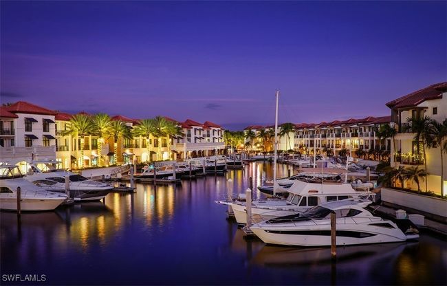 Dock area featuring a water view | Image 20