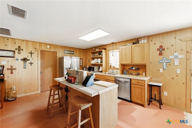 Kitchen eat-at bar main house | Image 8