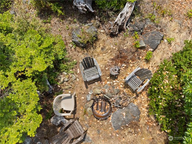 Firepit next to the water. | Image 29