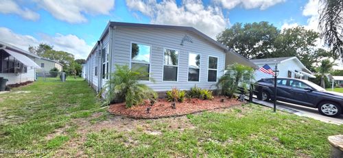 579 Dolphin Cir, Barefoot Bay, FL, 32976-2595 | Card Image