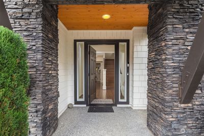 Covered entry with stone column accents | Image 2