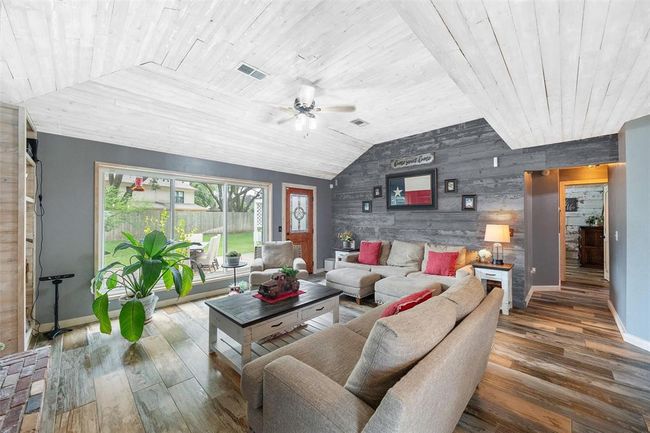 This digitally altered image showcases multiple design possibilities for a single space. The photo has been enhanced to illustrate variations in wall colors and lighting styles. Allowing viewers to visualize how the same room can be transformed through different design choices. | Image 8