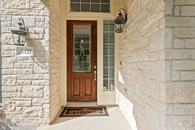 Entrance to property with stone siding | Image 4