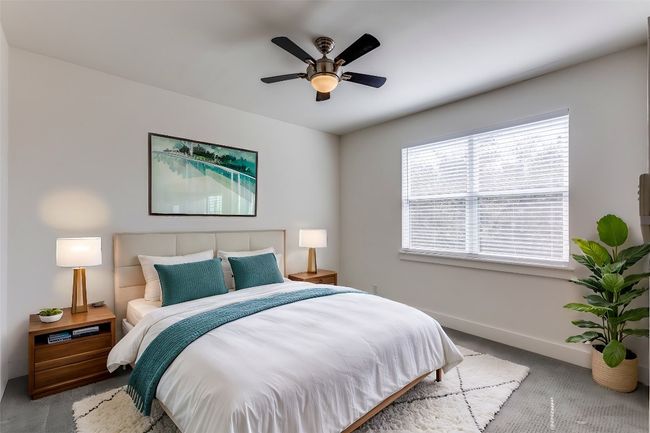 Bedroom with baseboards, ceiling fan, and carpet | Image 23