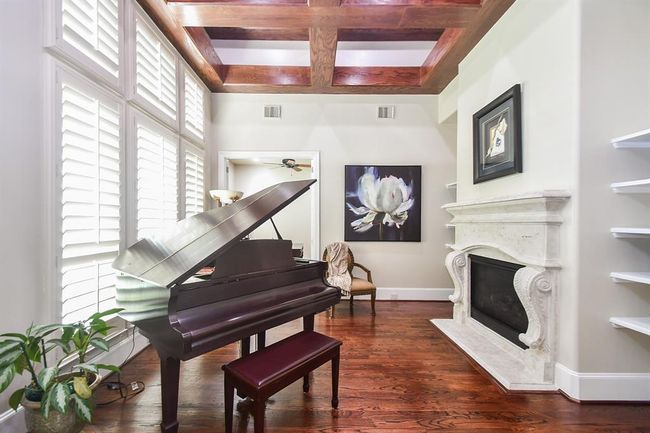 Cozy fireplace in the family room provide a perfect place to enjoy your loved ones | Image 12