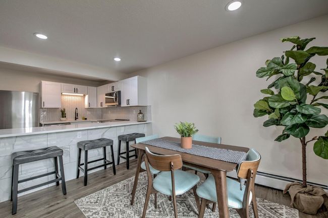 Dining space featuring light wood-type flooring and recessed lighting | Image 5