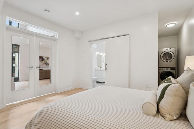 One more thoughtful touch: in-unit laundry tucked within the bedroom suite—stylish and efficient. | Image 18