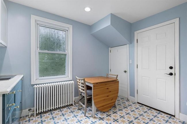 Tiled office with radiator heating unit | Image 6