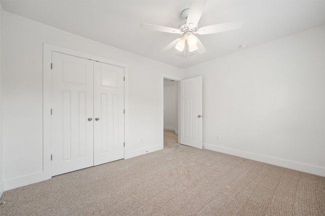 Each guest bedroom on the second floor is generously sized, providing flexibility for different needs; whether as a bedroom, home office, or personal retreat | Image 28
