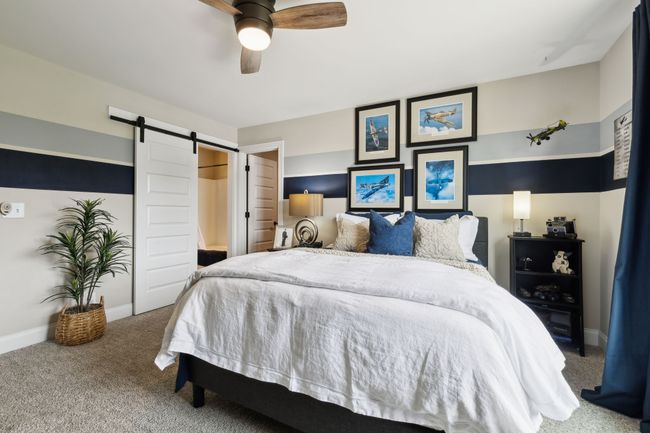 Bedroom #4 showing barn door into ensuite full bath. | Image 41