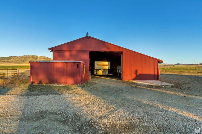 View of chicken coop in the front and barn in the back | Image 13