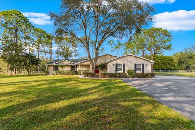 32576 Greenwood Loop, House other with 4 bedrooms, 3 bathrooms and null parking in Wesley Chapel FL | Image 1