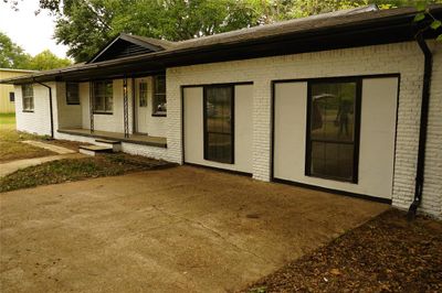 Back of property with a porch and a patio | Image 2