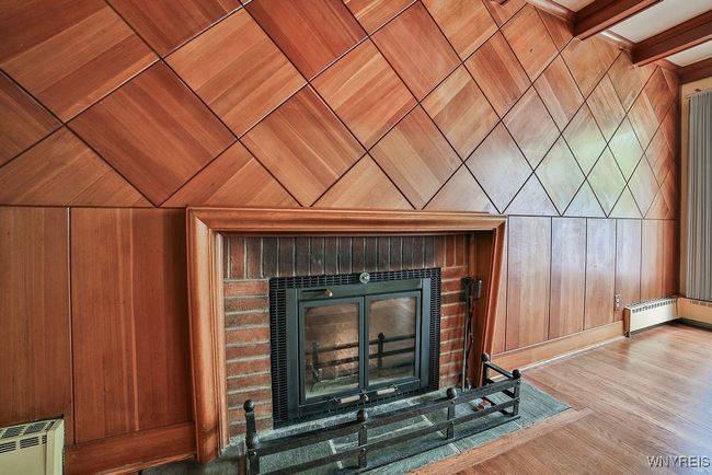 woodburning firepace with stunning parquet wood | Image 10