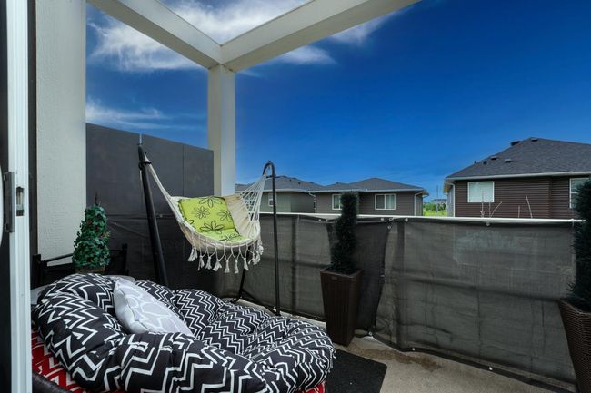 610 Redstone View Ne, Townhouse with 2 bedrooms, 3 bathrooms and 2 parking in Calgary AB | Image 16