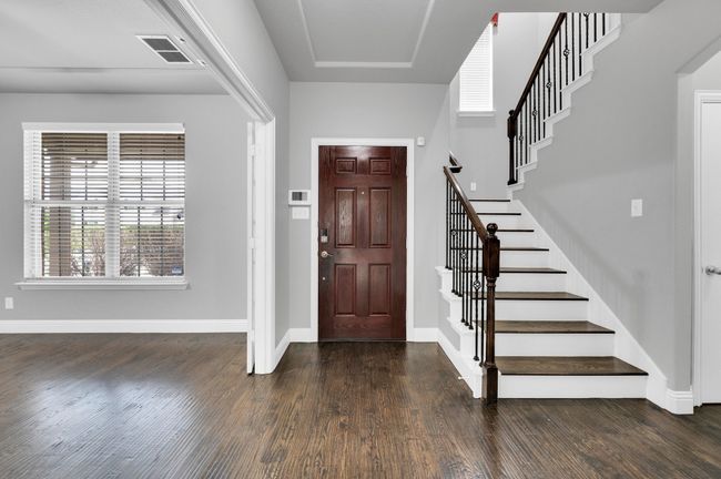 Foyer with wood floors. Office is located to the left. | Image 4
