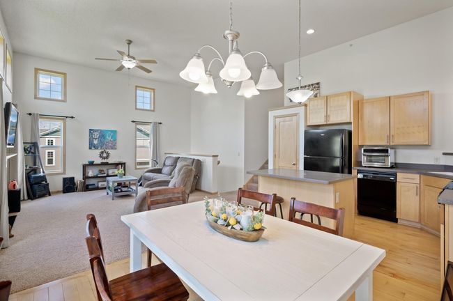 View of the main floor living area from informal dining. | Image 10