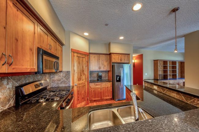 310 - 107 Armstrong Place, Home with 2 bedrooms, 2 bathrooms and 2 parking in Canmore AB | Image 10