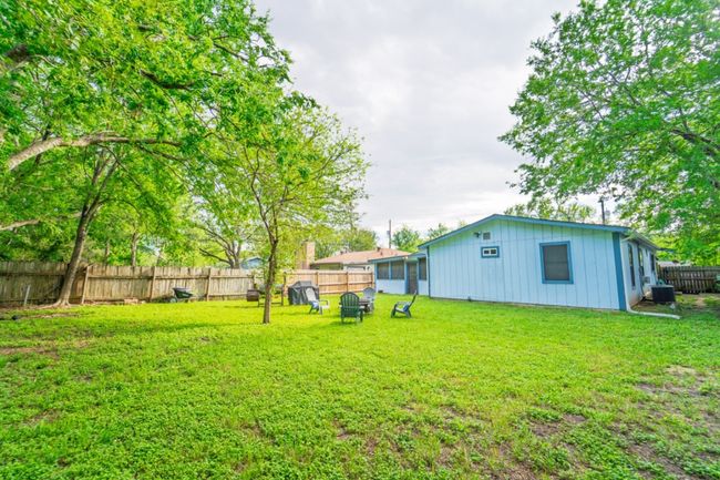 View of fenced backyard | Image 30