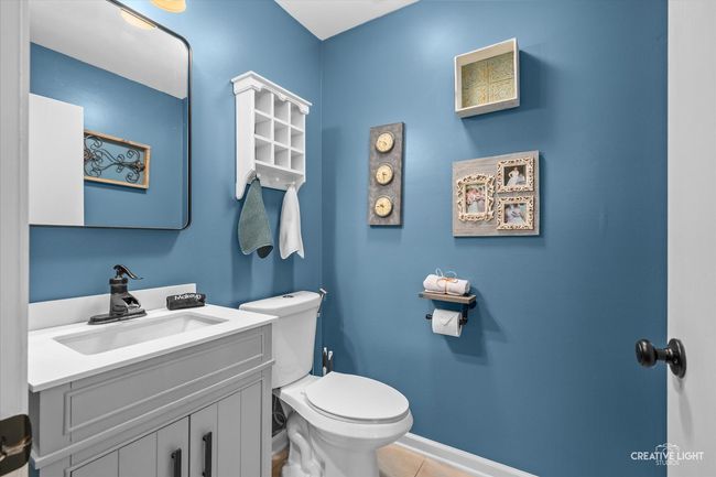 Main floor powder room is great for guests and is | Image 12