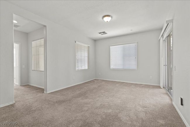 Spare room with carpet floors and plenty of natural light | Image 19