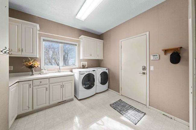 Laundry room on the main level | Image 29