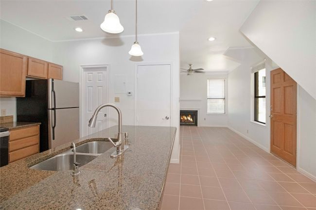 The Kitchen open to the Entry into the Living/Dining Combo. | Image 16