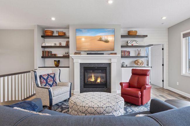 Gas Fireplace and Built ins at the Living Room | Image 7