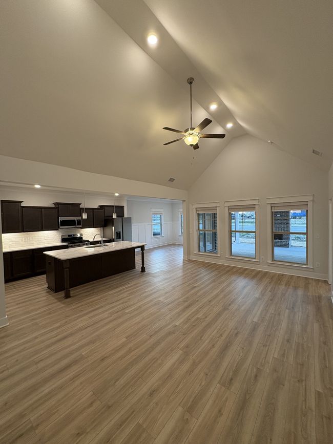 STOCK PHOTO. SELECTIONS WILL VARY IN ACTUAL HOUSE. Open concept home w/ cathedral ceilings. | Image 7