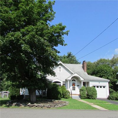 View of front of house featuring a garage | Image 1