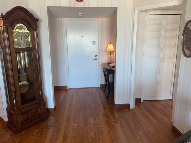Living area with wood finished floors | Image 4