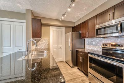 8405 - 403 Mackenzie Way Sw, Condo with 3 bedrooms, 2 bathrooms and 1 parking in Airdrie AB | Image 2