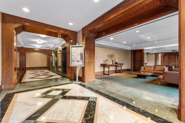 Building lobby with recessed lighting and ornamental molding | Image 23