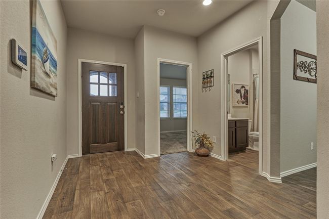 Looking back at the entrance. To the right you have the first secondary bedroom and a hall bath. All secondary bedrooms have roomy closets. | Image 8