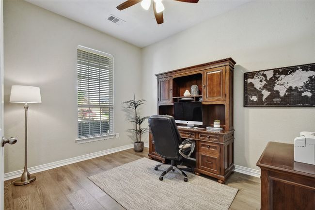 There is a dedicated office space towards the front of the home, on the opposite side from the bedrooms. | Image 15