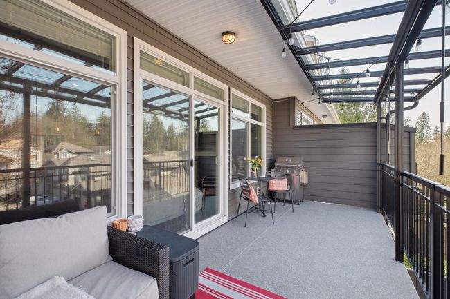 Exterior space with a grill and a balcony | Image 25