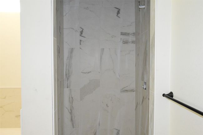Full bath featuring tiled shower | Image 15