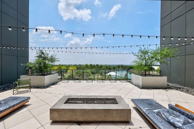 View of patio / terrace with an outdoor fire pit | Image 23