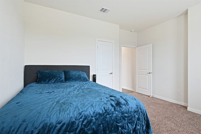 Bedroom featuring carpet flooring and baseboards | Image 20