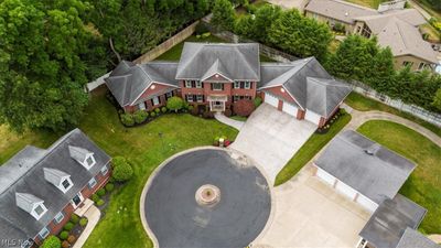 Aerial view of estate home with direct access to Parkersburg Country Club by golf cart. | Image 3